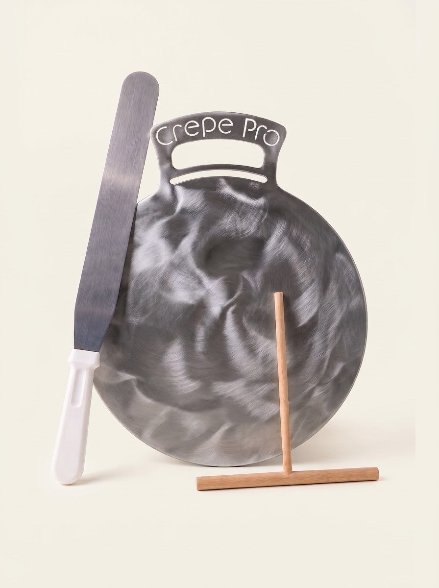 The Crepe Pro 12-inch Carbon Steel Bundle Kit with 12-inch bent-handle pan, 7-inch beechwood batter spreader, and 14-inch stainless steel spatula